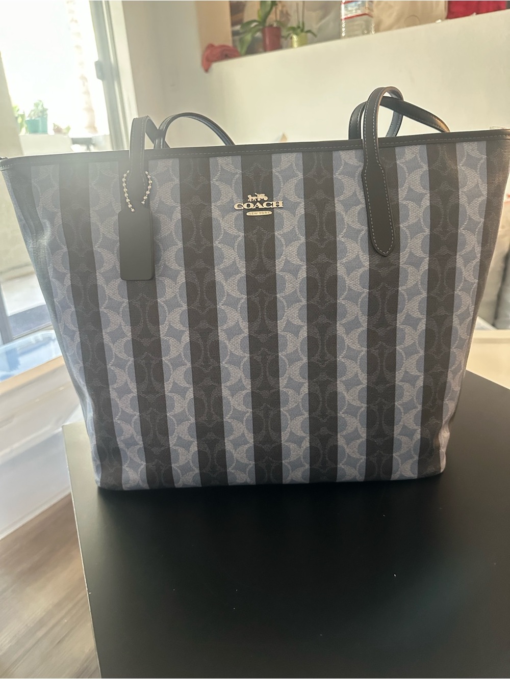 COACH OUTLET’S  CITY TOTE BAG.